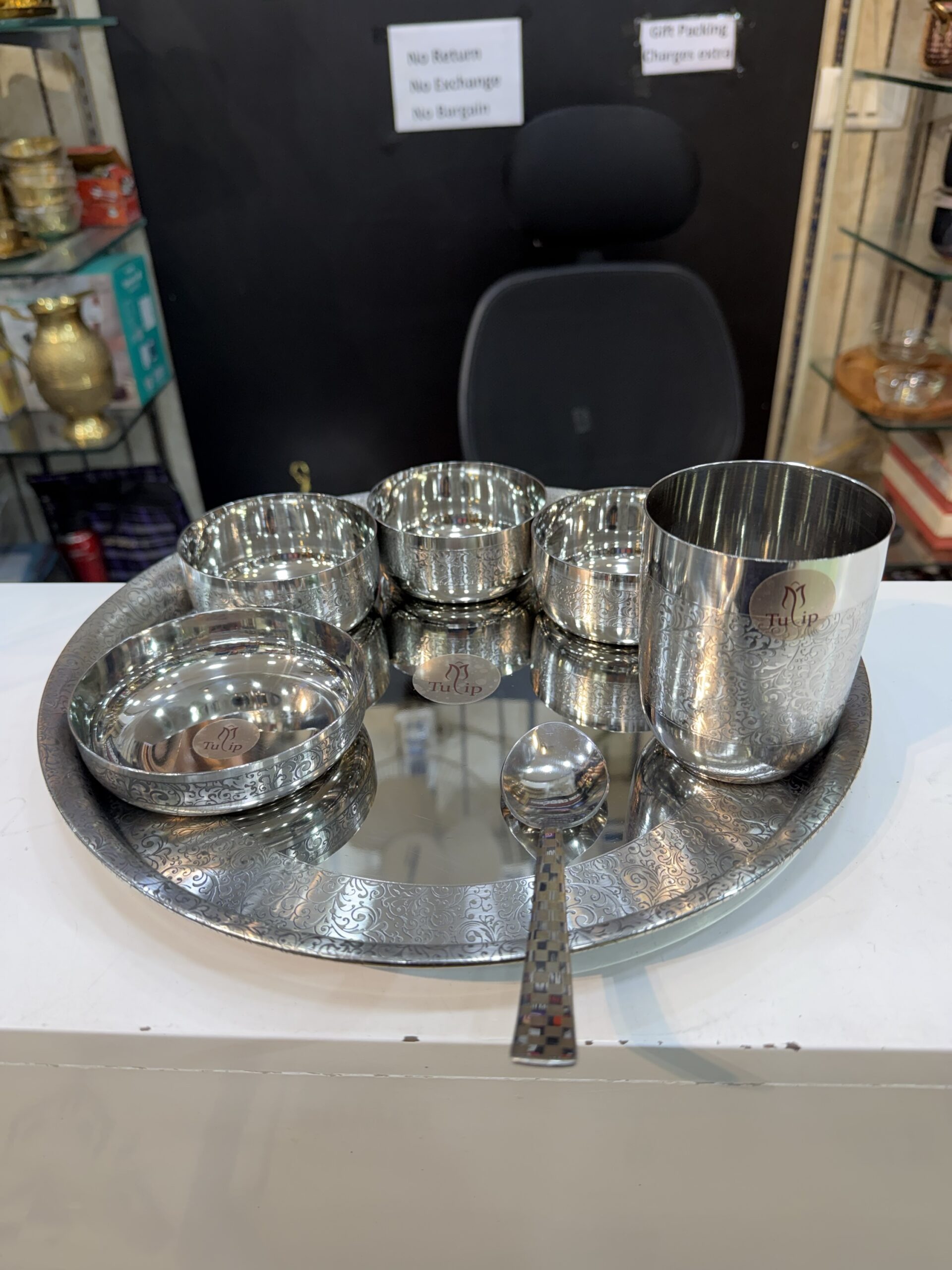 Tulip 7 pieces stainless steel thali set with etching hand work with box packing